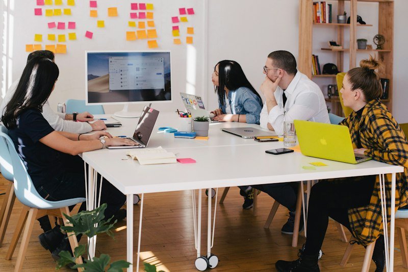 Practice leads collaborating around a work table